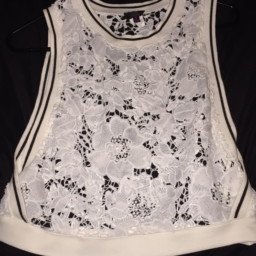 A white flower shirt that is see through
